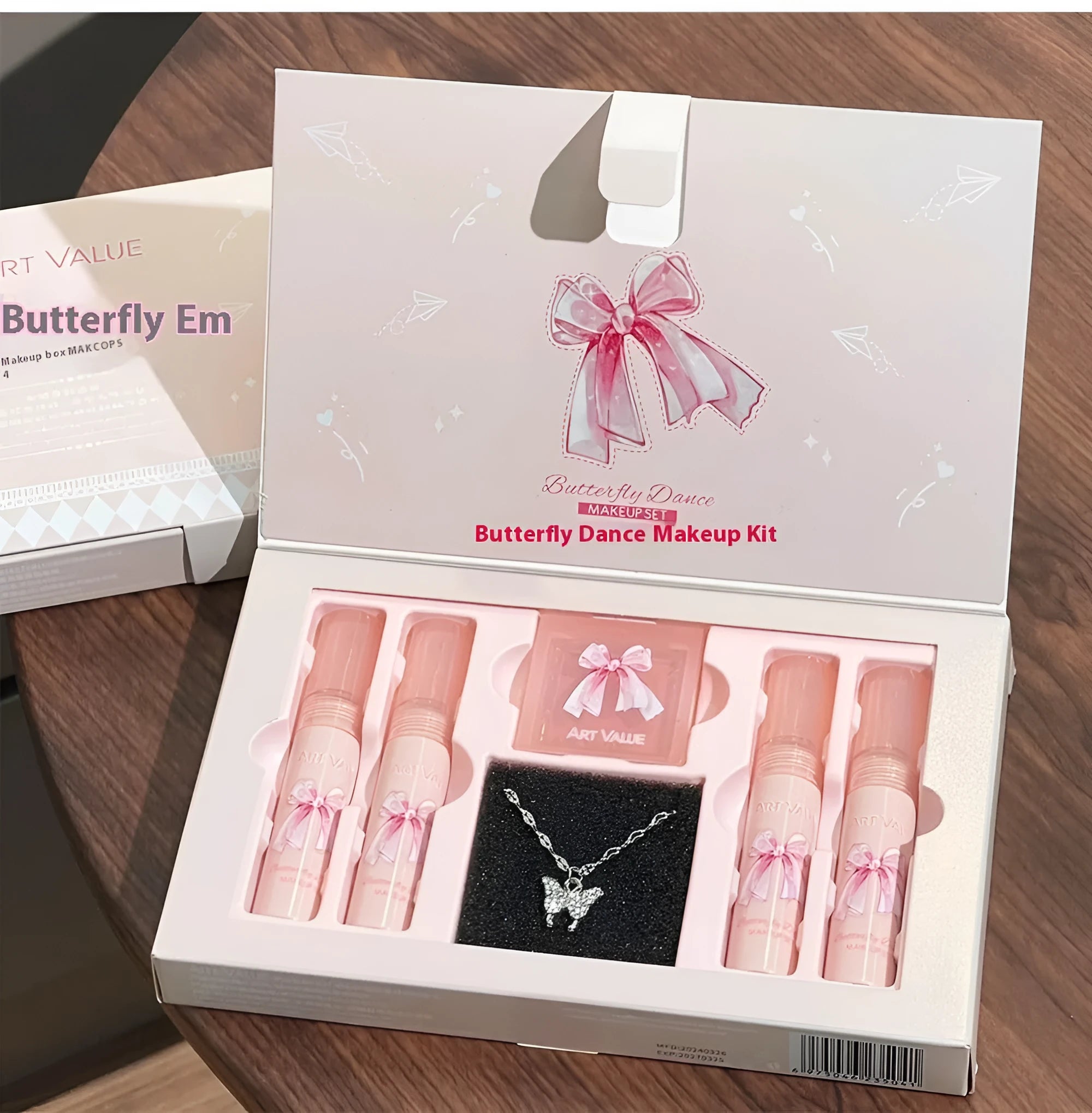 Butterfly Box makeup set showing four matte lip mud pots, powder blusher compact, and decorative necklace