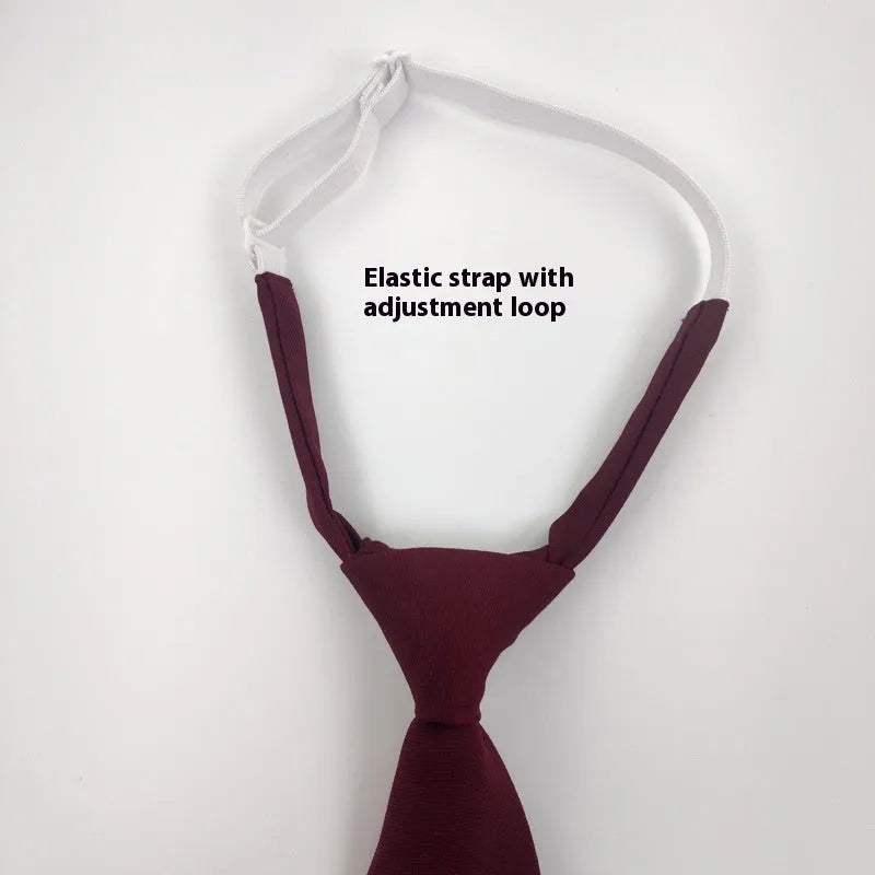 Men's solid colour cotton bow tie in arrow style, shown in navy blue.