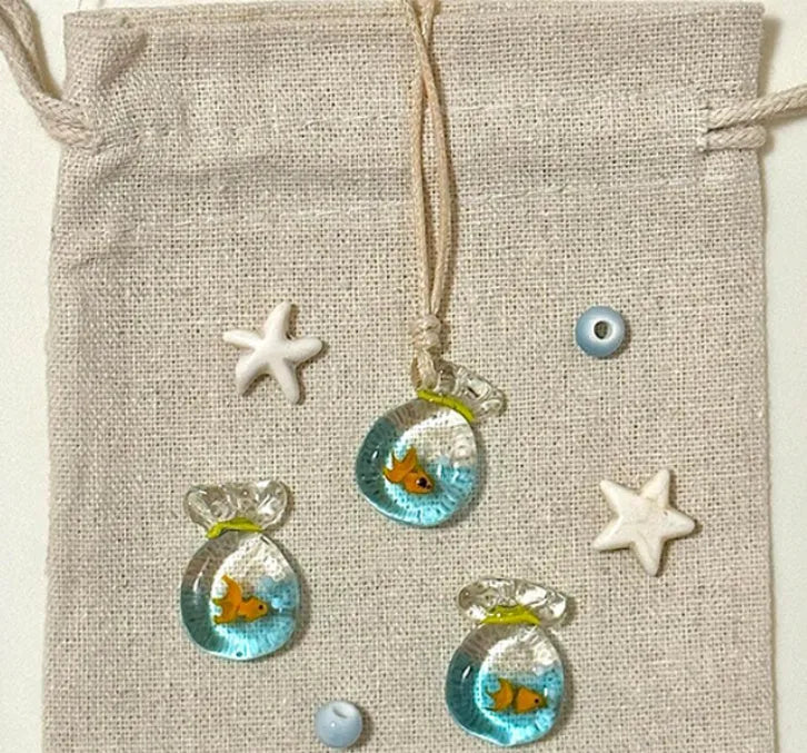 Women's coloured glaze skirt pendant necklace with joker design on cotton linen chain