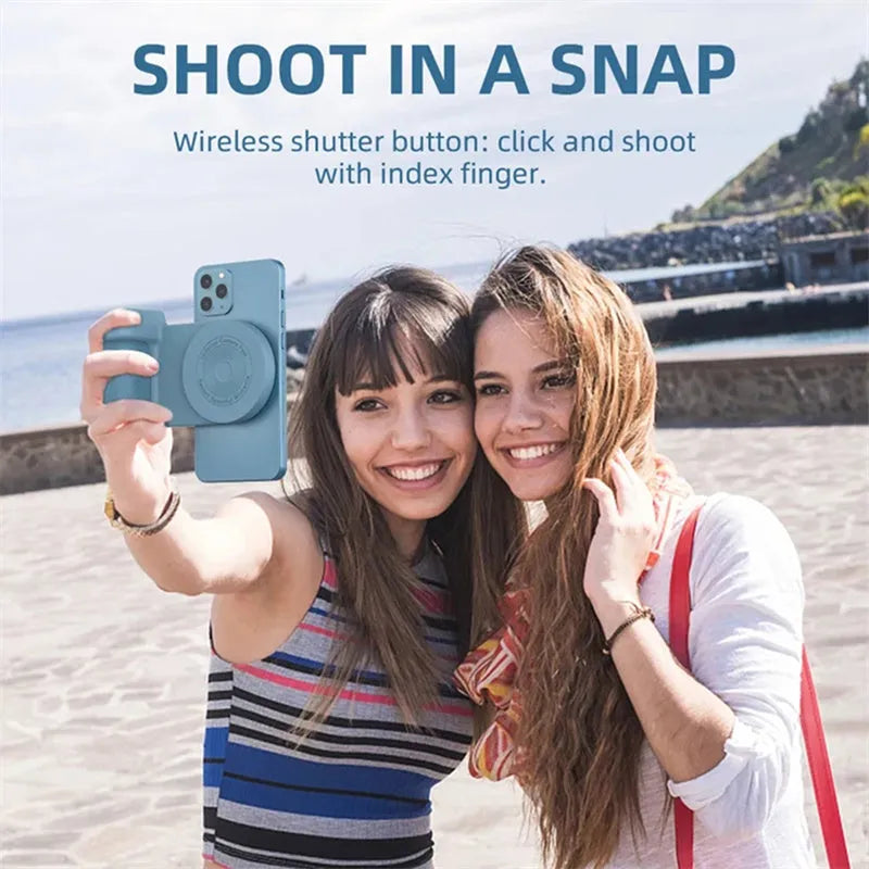 Black multifunctional magnetic phone camera holder with ergonomic PU leather grip on a table.