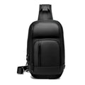 Black medium PVC outdoor shoulder bag showing air cushion strap, soft handle, and internal organiser pockets.