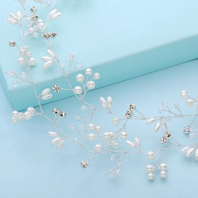 Bridal pearl hair band in silver, gold, or rose gold on a white background, showing wired construction.