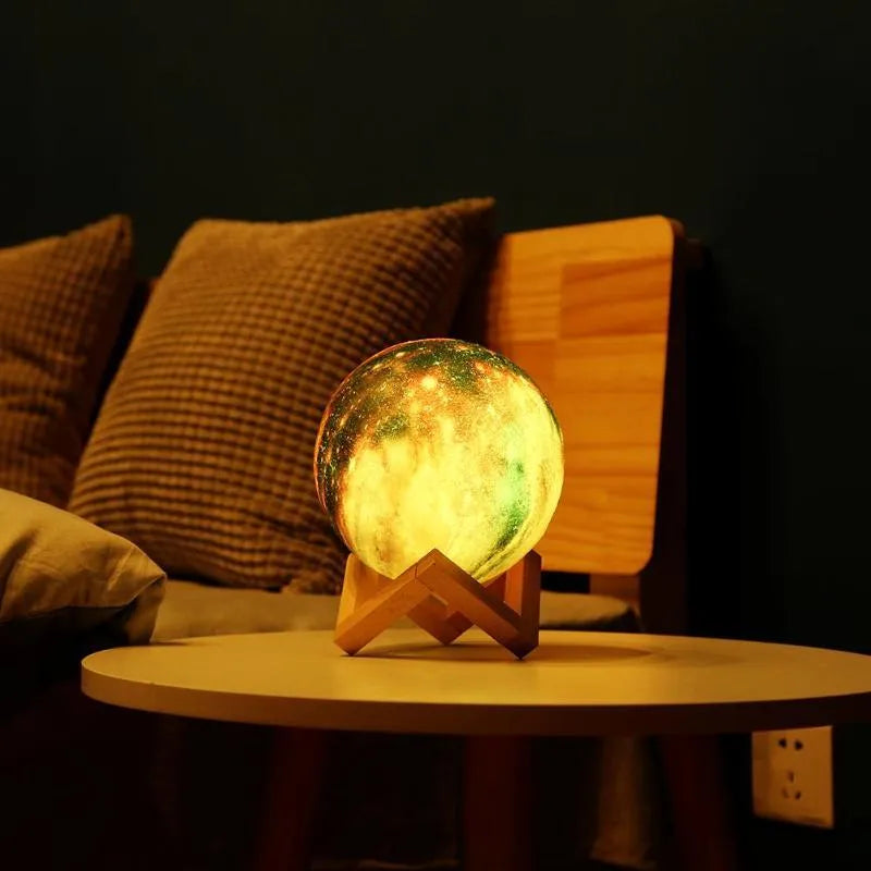 3D printed spherical lunar night light with colour changing LEDs and touch control.