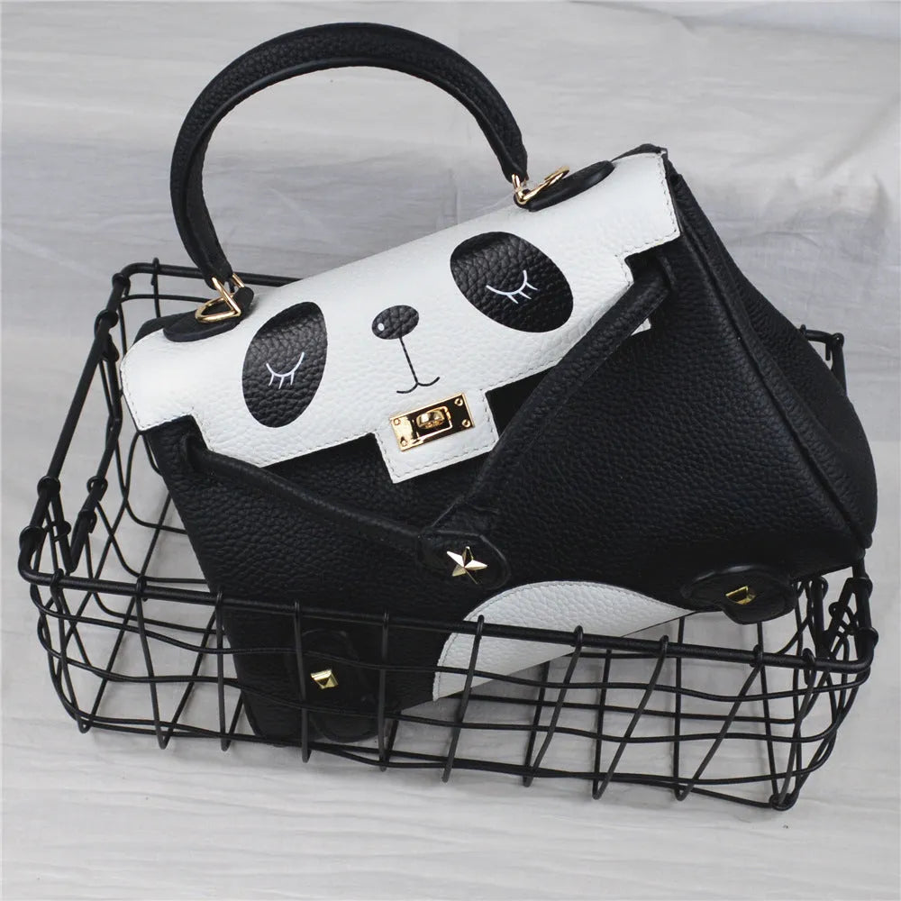 Square horizontal cow leather handbag with panda animal print pattern showing printing elements
