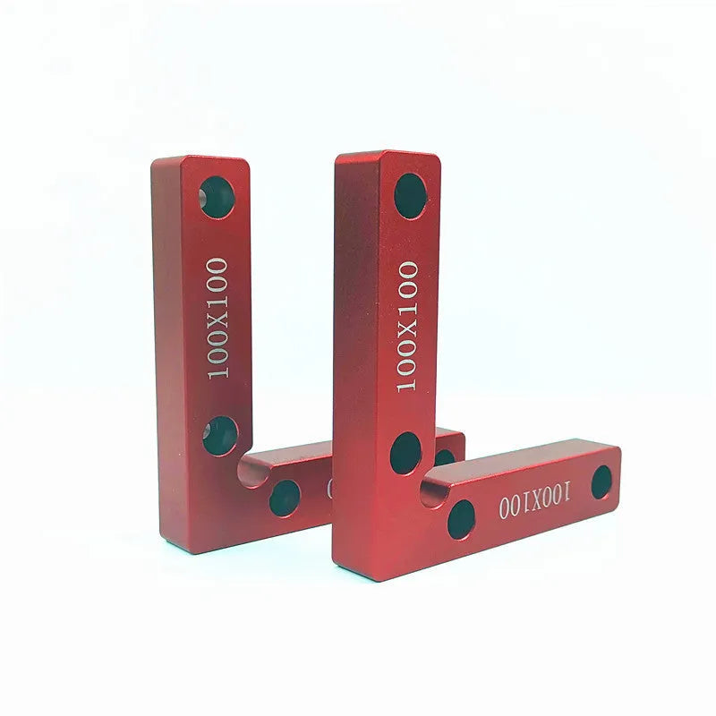 Aluminium right angle positioning clamp block for woodworking jigs, showing 90-degree corner and scale markings.