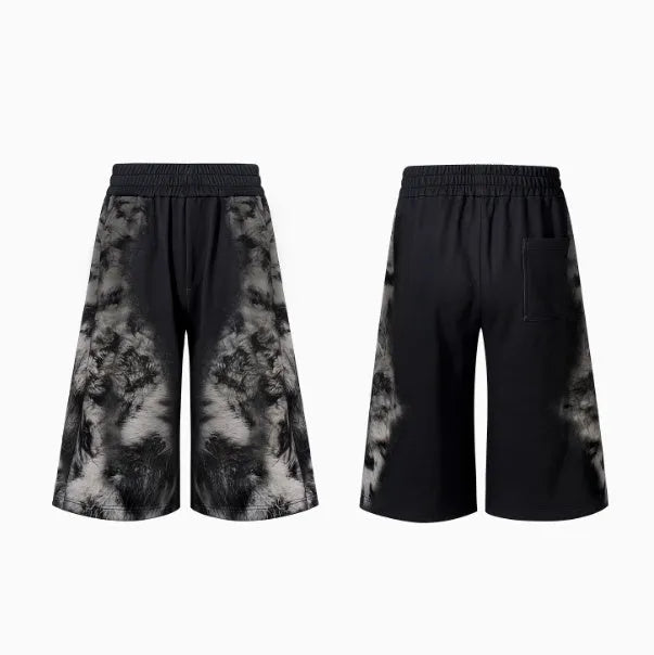 Loose fit printed street style trousers set with hoodie on a neutral background