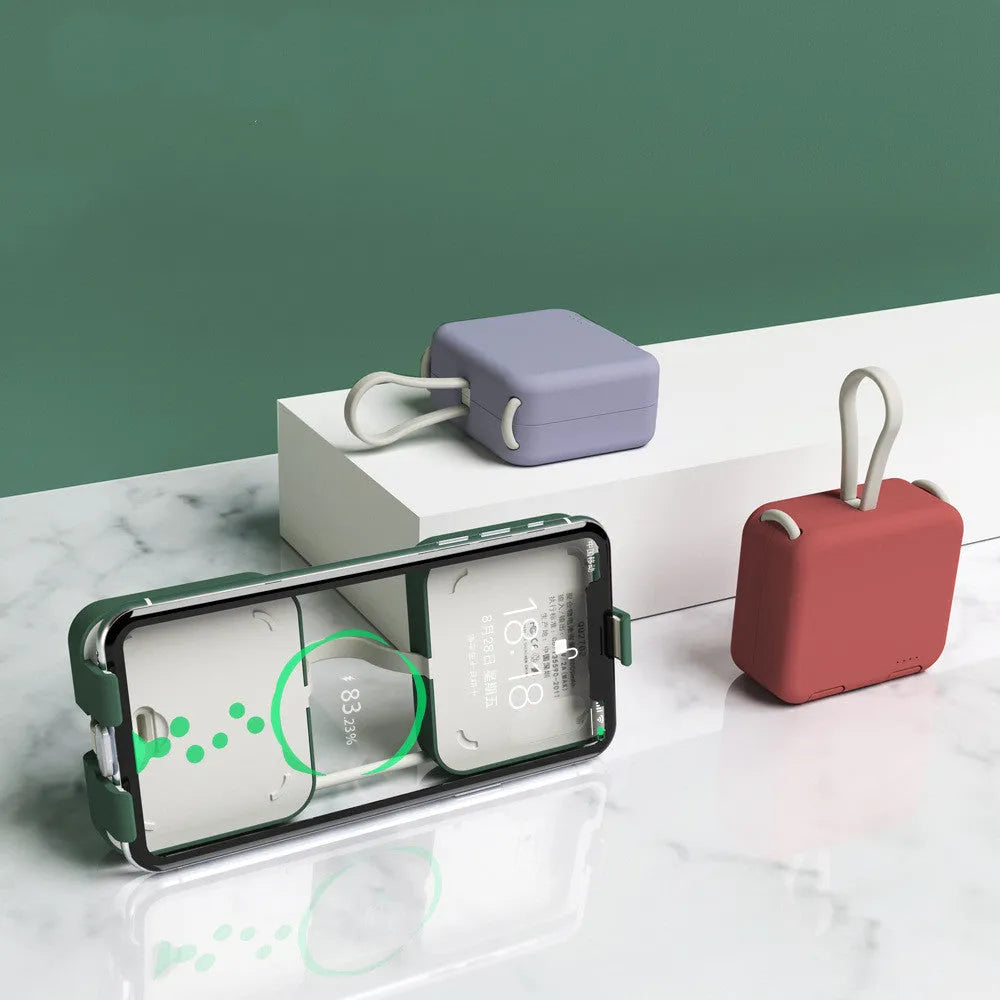 Handbag clip-on power bank in blue showing phone stand function and Type-C/Lightning ports.