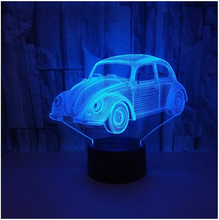 Small modern table lamp with 3D acrylic shade and black ABS base on a desk.