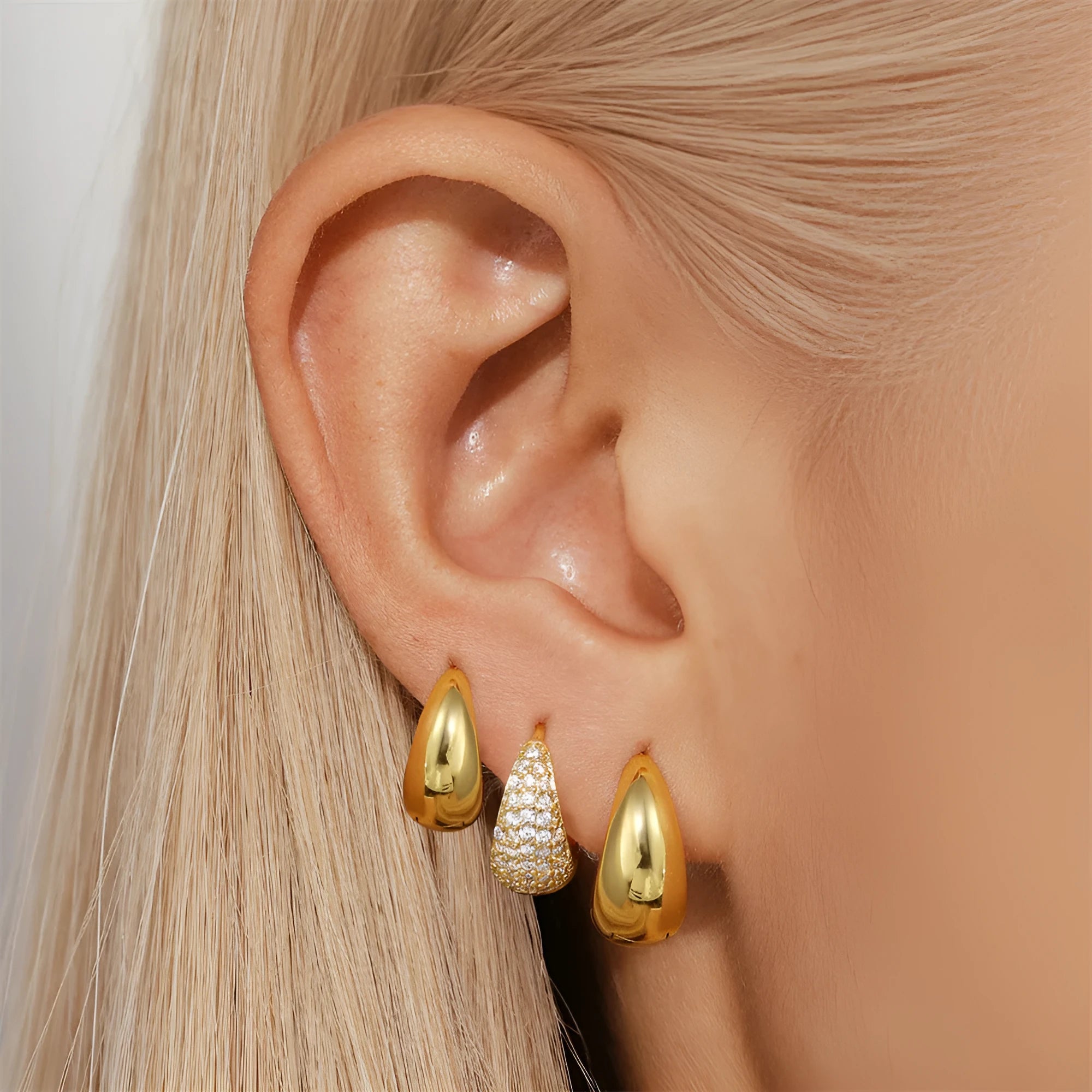 Brass geometric earclip earrings with electroplated golden finish, round shape design