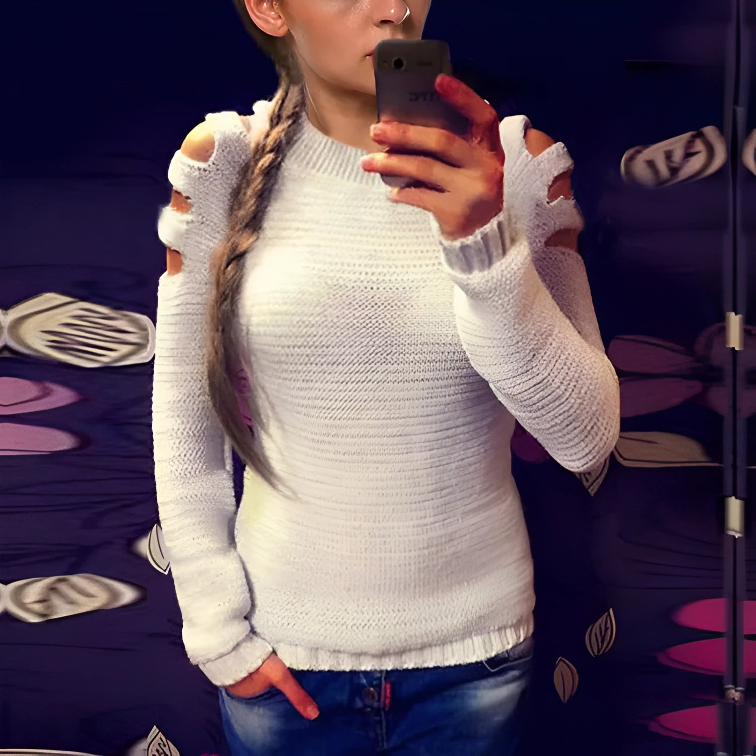 White women's knitted shirt with hollow-out crocheted pattern and long sleeves