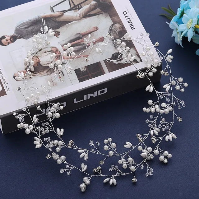 Bridal pearl hair band in silver, gold, or rose gold on a white background, showing wired construction.