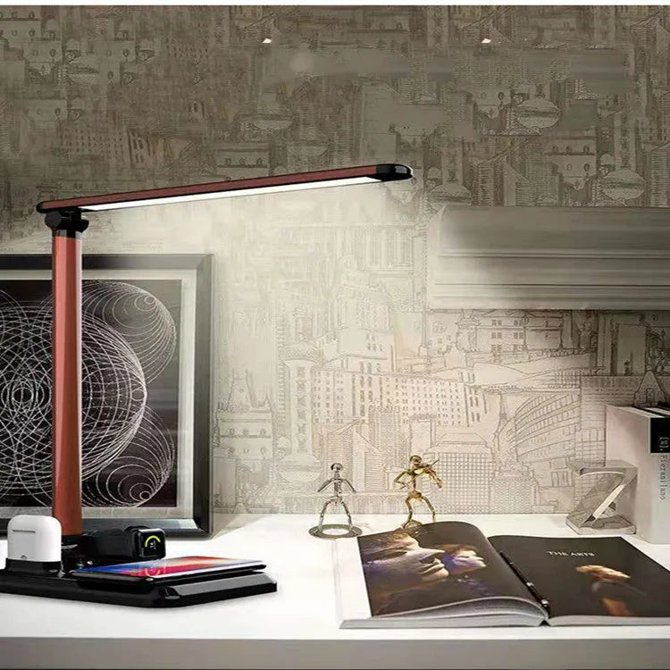 Black or white X-1 4-in-1 LED desk lamp showing wireless charging surface and USB port