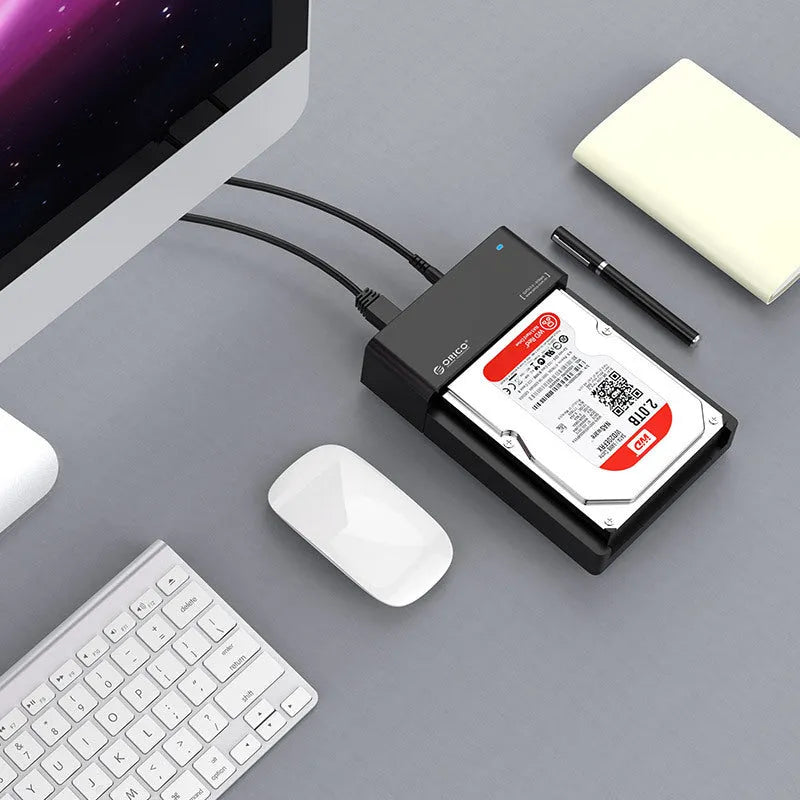 Black plastic 2.5-inch SATA hard drive enclosure with USB 3.0 cable for portable external storage