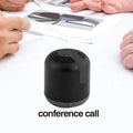 Hieha XQ11 cylindrical wireless Bluetooth speaker in silver colour on a table.
