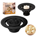 Four black steamed bun moulds for shaping baozi and dumplings
