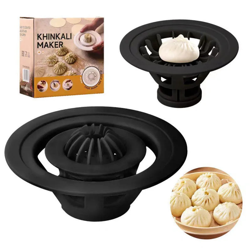 Four black steamed bun moulds for shaping baozi and dumplings