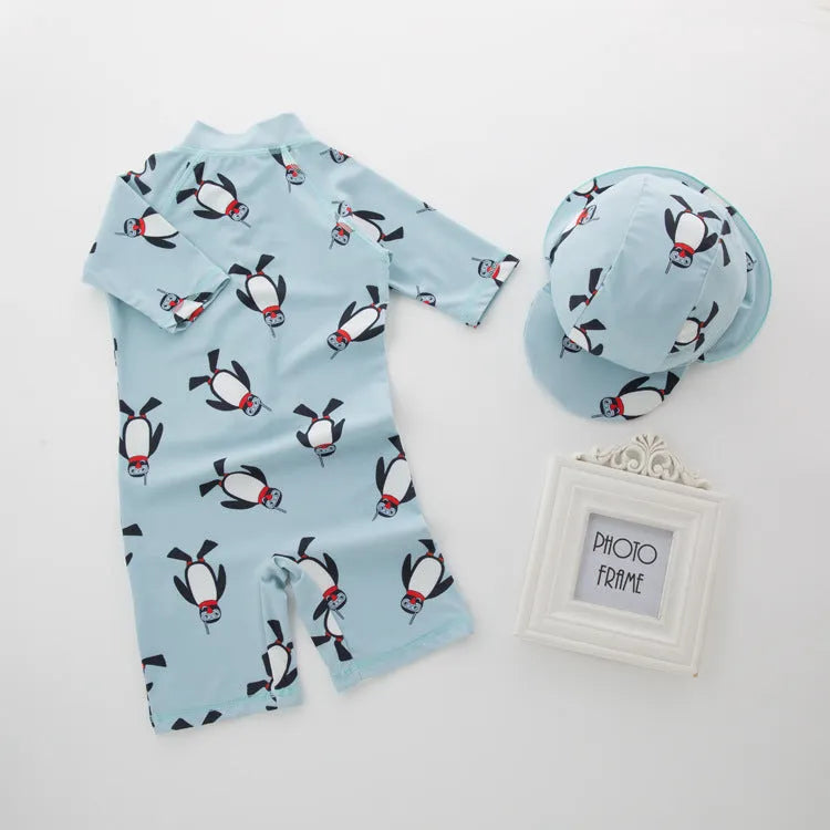 Boys penguin print long sleeve swimsuit with matching swimming cap