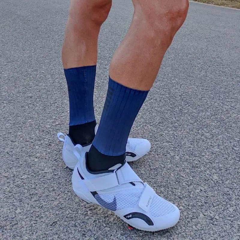 Athletic sports socks for cycling and running in multiple colour options with moisture-wicking fabric