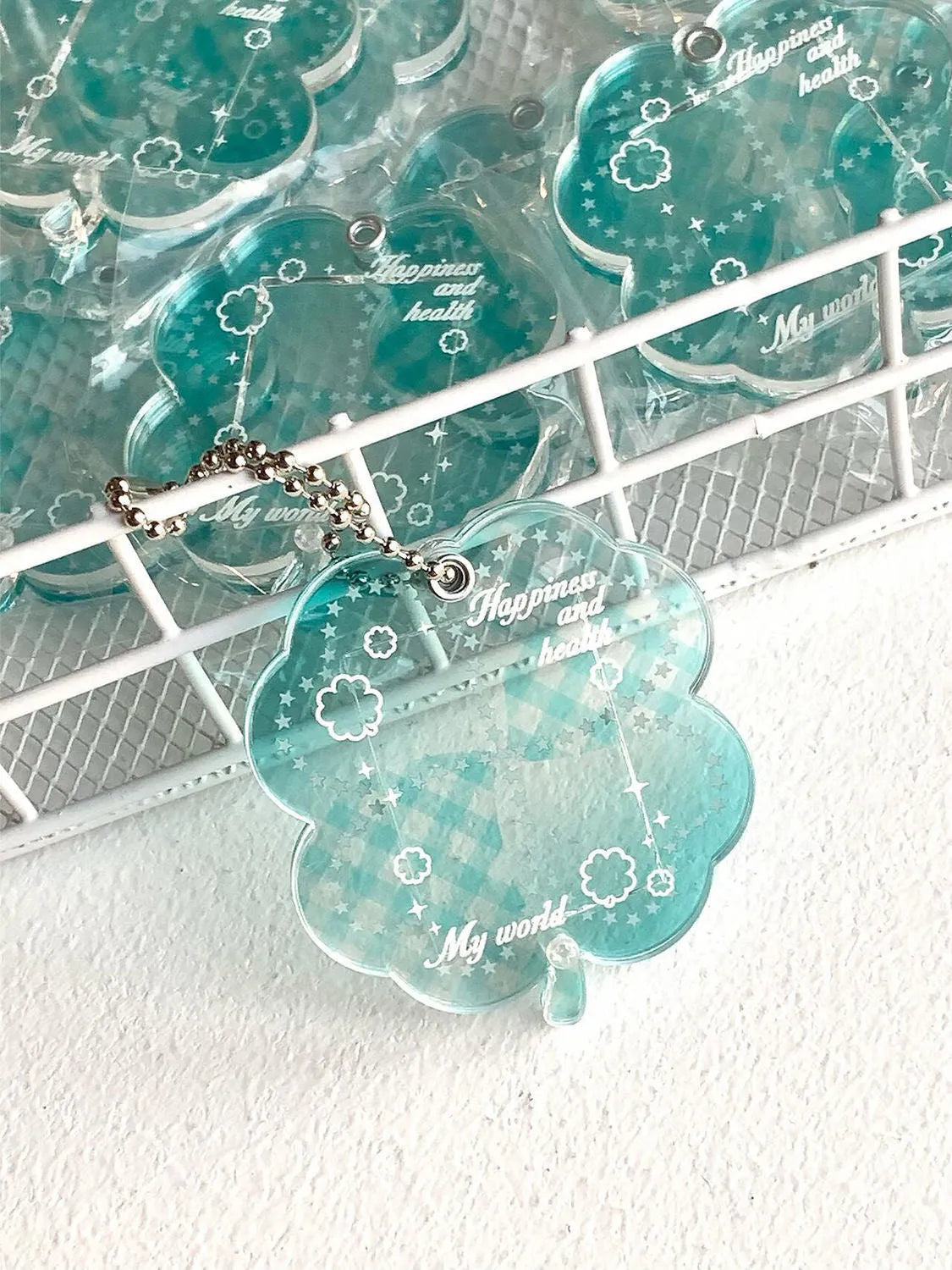 Acrylic four-leaf clover phone pendant keychain in blue, green and mint colours