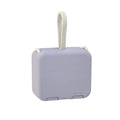Handbag clip-on power bank in blue showing phone stand function and Type-C/Lightning ports.