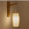 Bamboo plaited table lamp with natural texture and E27 fitting for bedside or hallway lighting