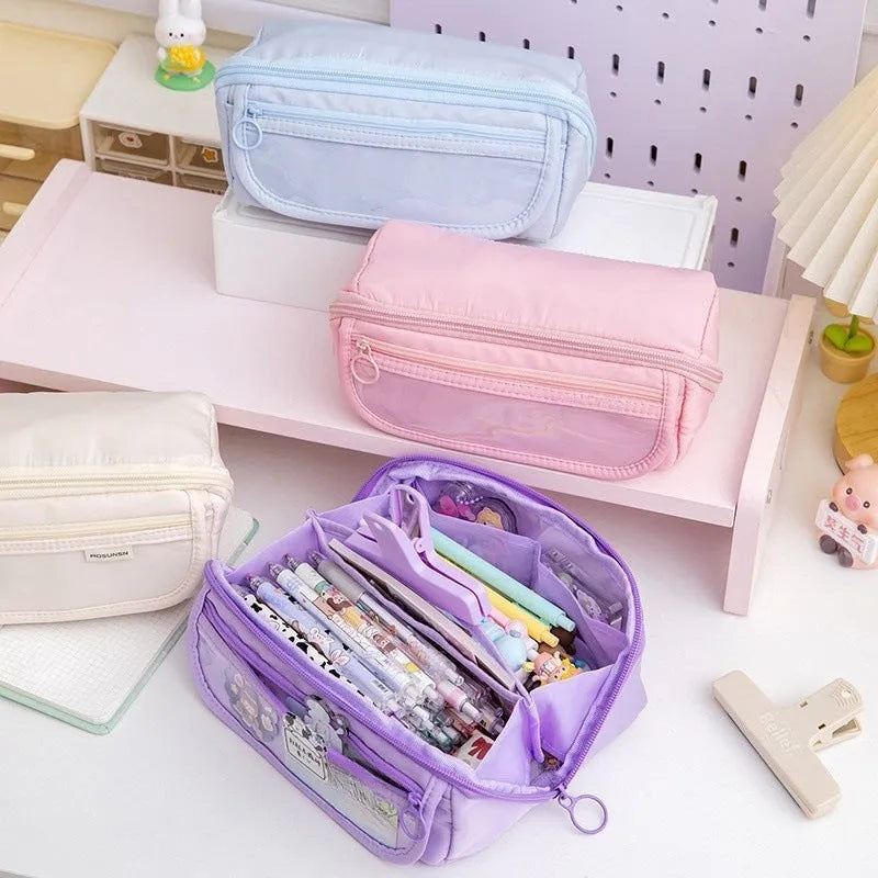 Canvas pencil case with ten flip layers open, showing compartments, in premium Black colour.