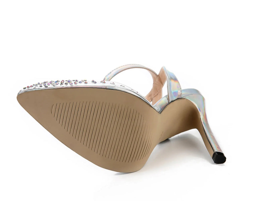 Women's pointed-toe stiletto sandals with a clear PVC upper.