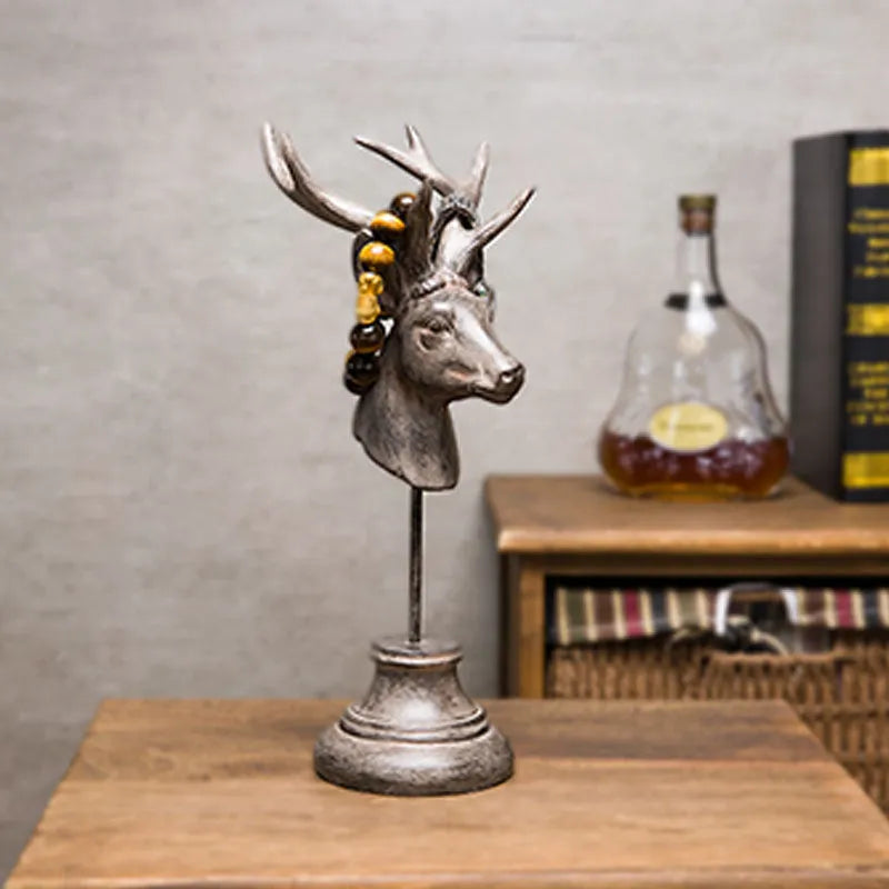 Woodland animal resin sculpture home decoration in black, white, and wood colour finishes.