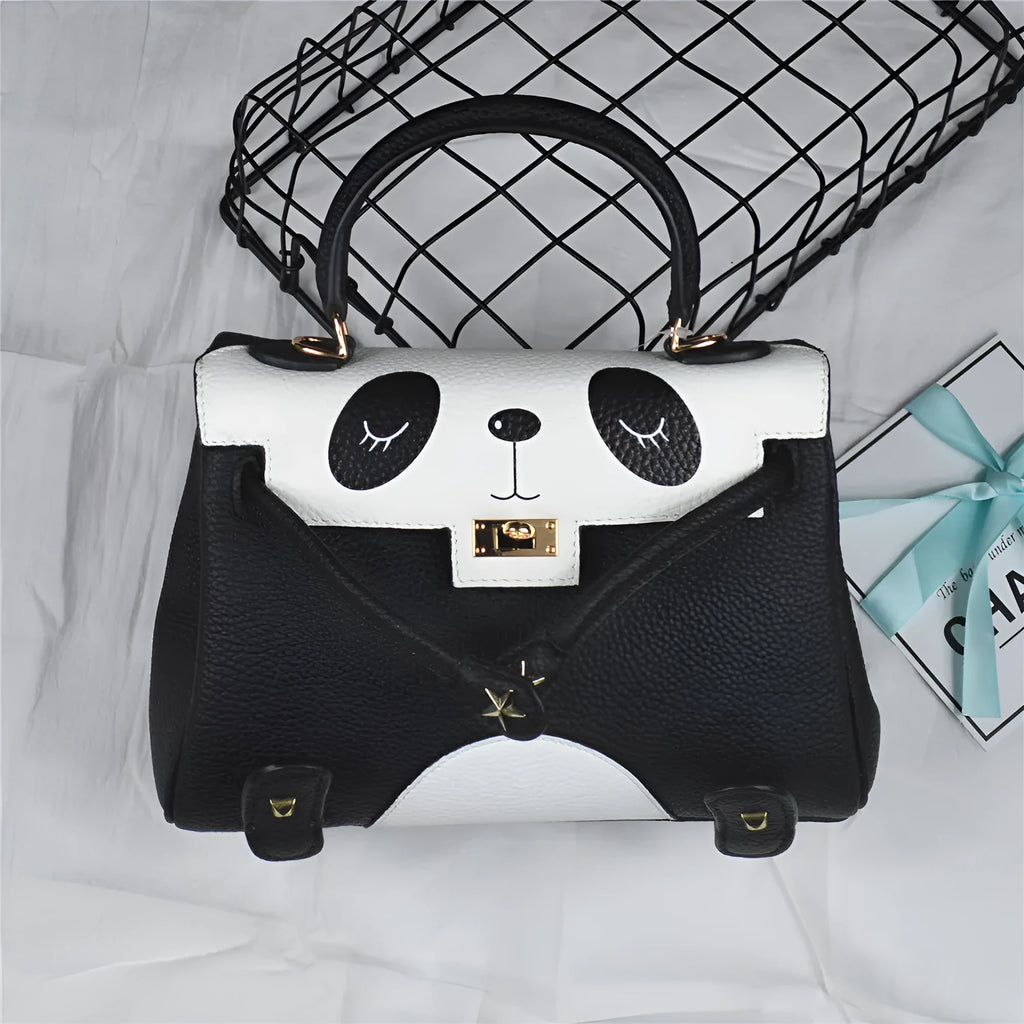 Square horizontal cow leather handbag with panda animal print pattern showing printing elements