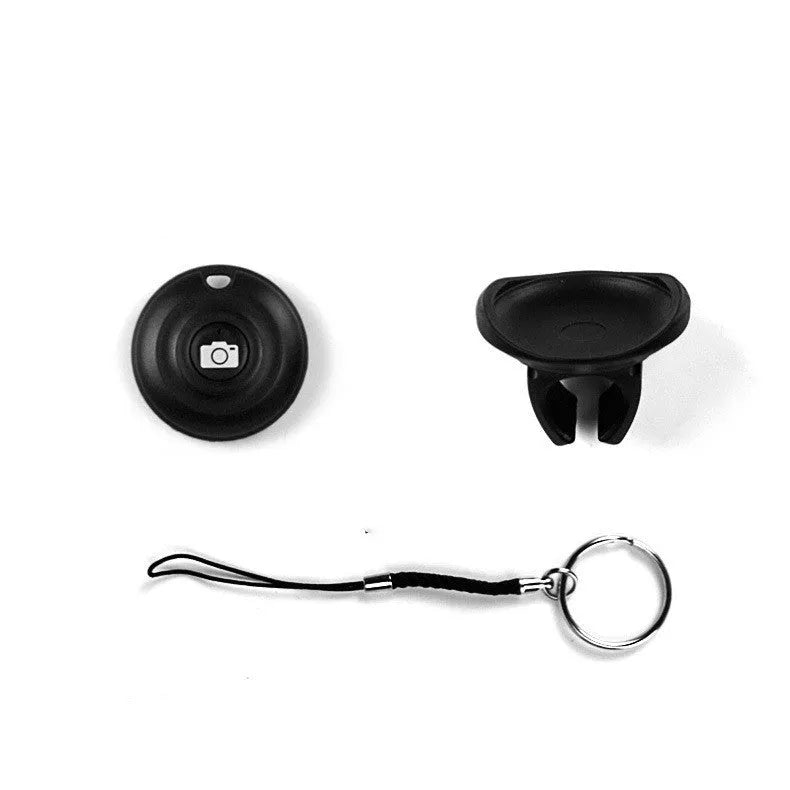 Black Bluetooth remote control for wireless selfie photography with smartphone connection