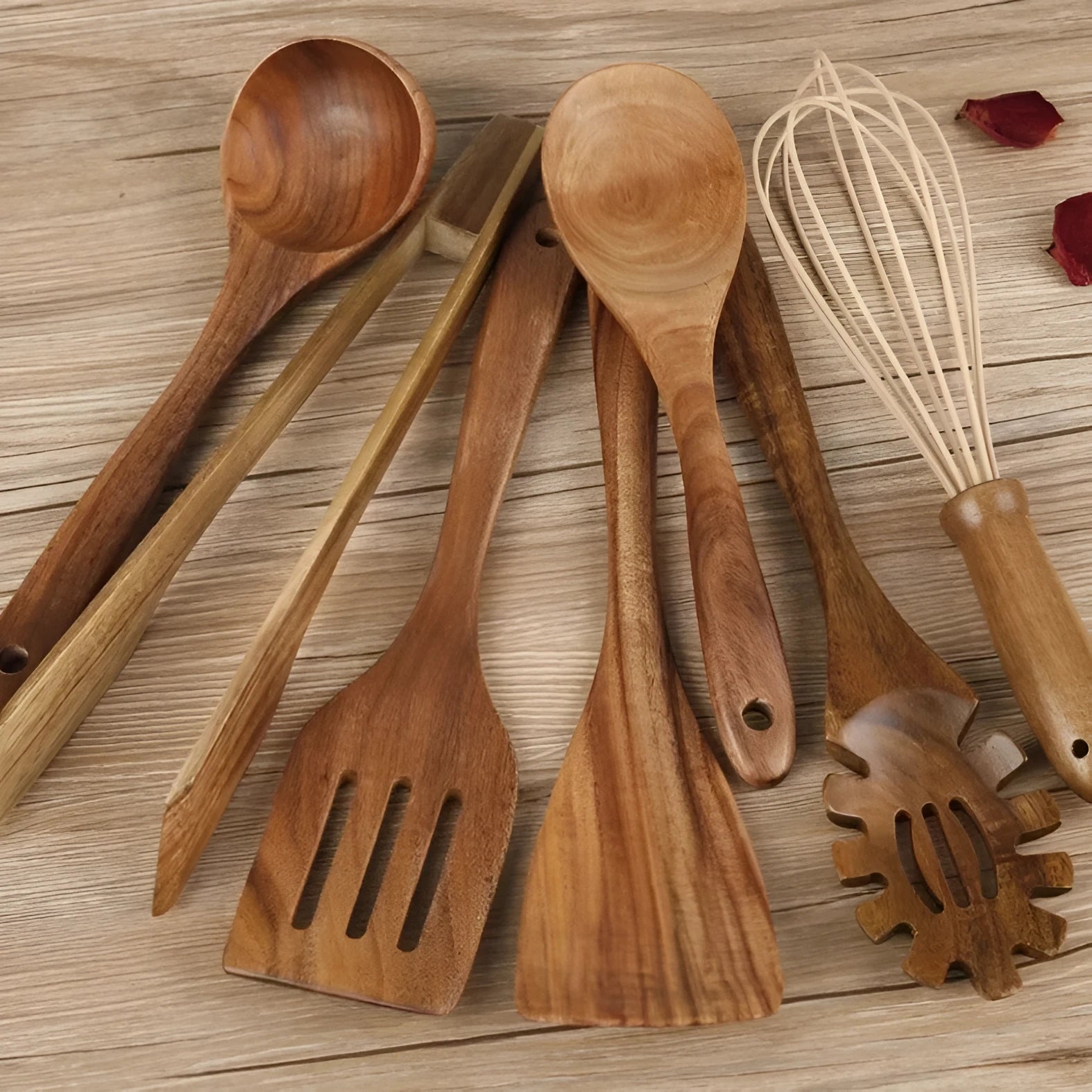 Seven wooden cooking utensils including spoons and shovels with non-slip handles