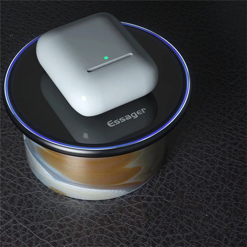 Black wireless charging pad with LED indicator light for smartphones and headphones