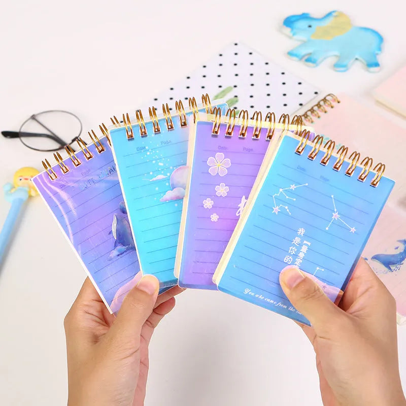 Spiral bound A7 pocket notepad with PP cover shown in Constellation, Sakura, Universe, and Ocean design options.