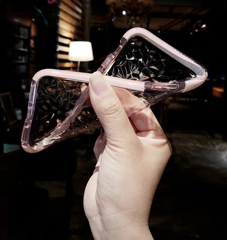 Flexible TPU iPhone case with striped back design in black, pink, and white border options.
