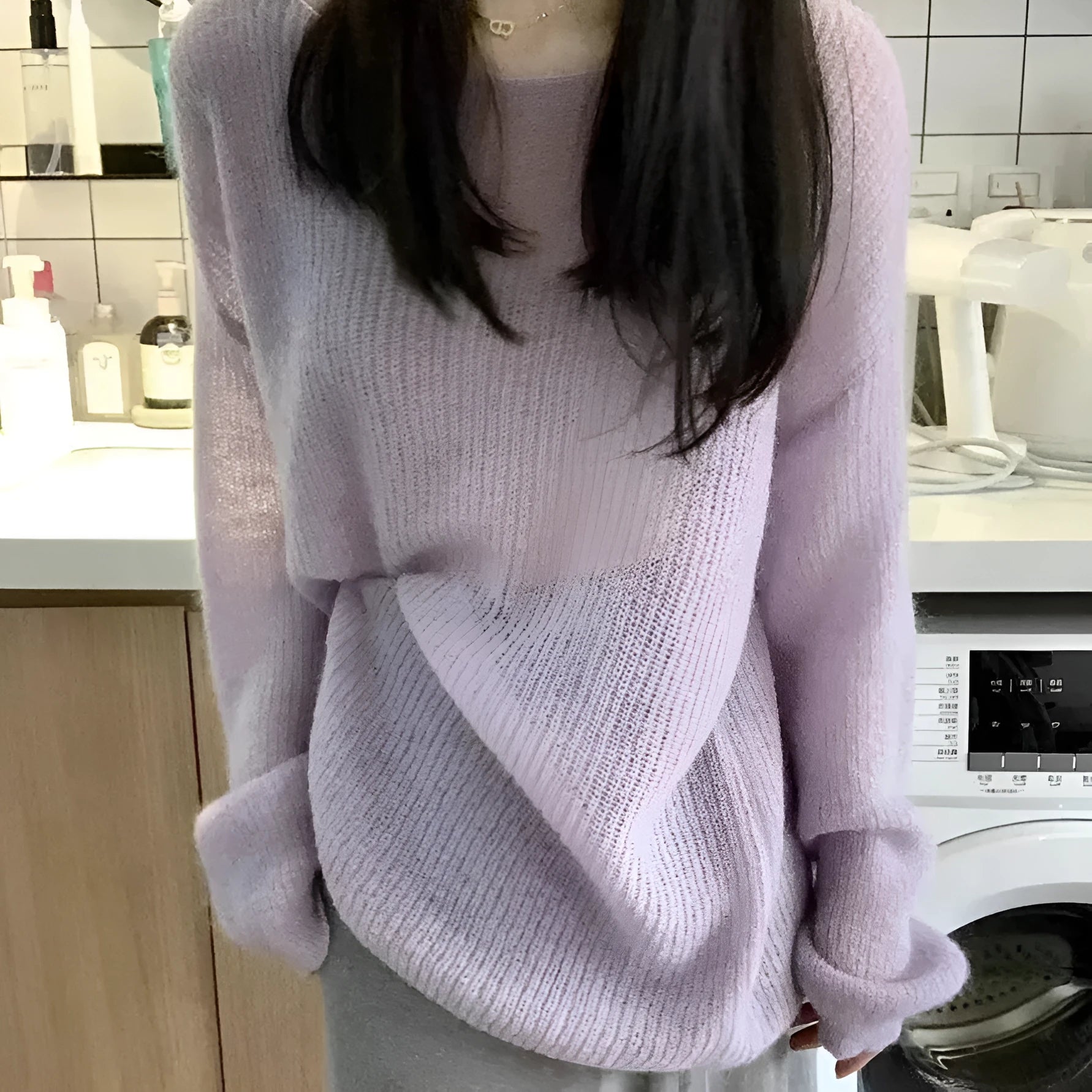 Purple women's blouse with princess sleeves and hollow out detailing, made from ice silk fabric.