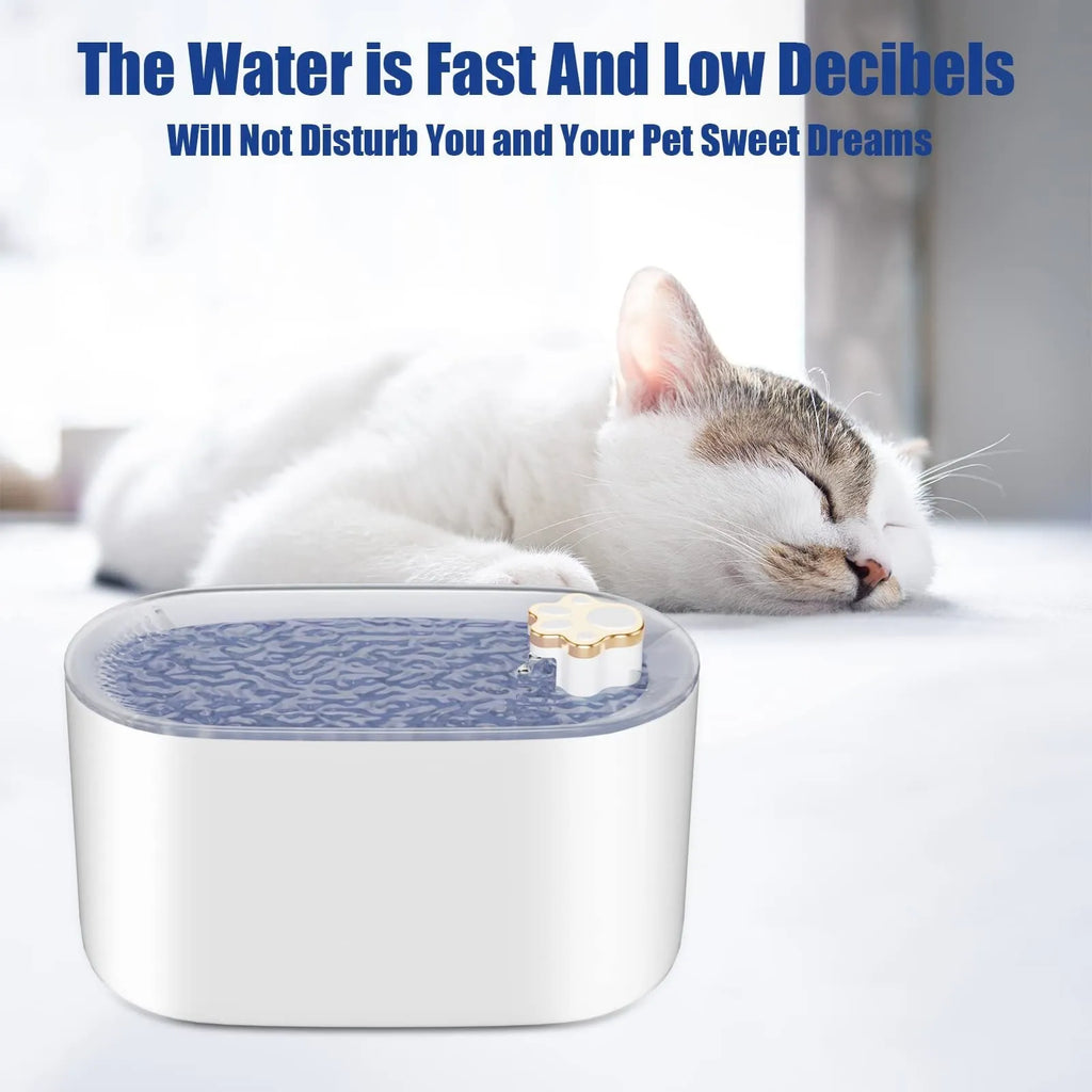Blue automatic pet water fountain with filter on a floor next to a cat
