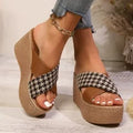 Casual brown plaid wedge sandals with a cross leopard pattern and a rubber sole.