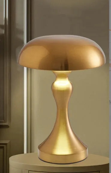Metallic desk lamp with touch controls showing three colour lighting options
