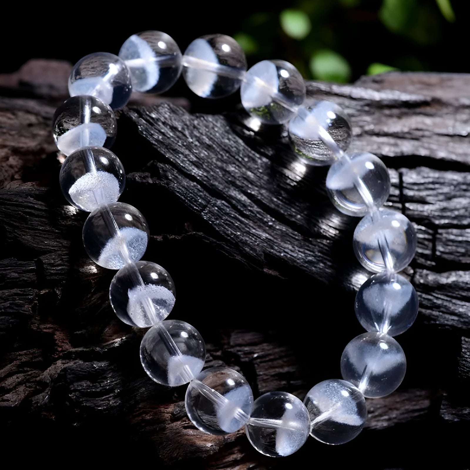 Women's white crystal ghost pyramid bracelet with Ruyi design element showing multiple purity size options