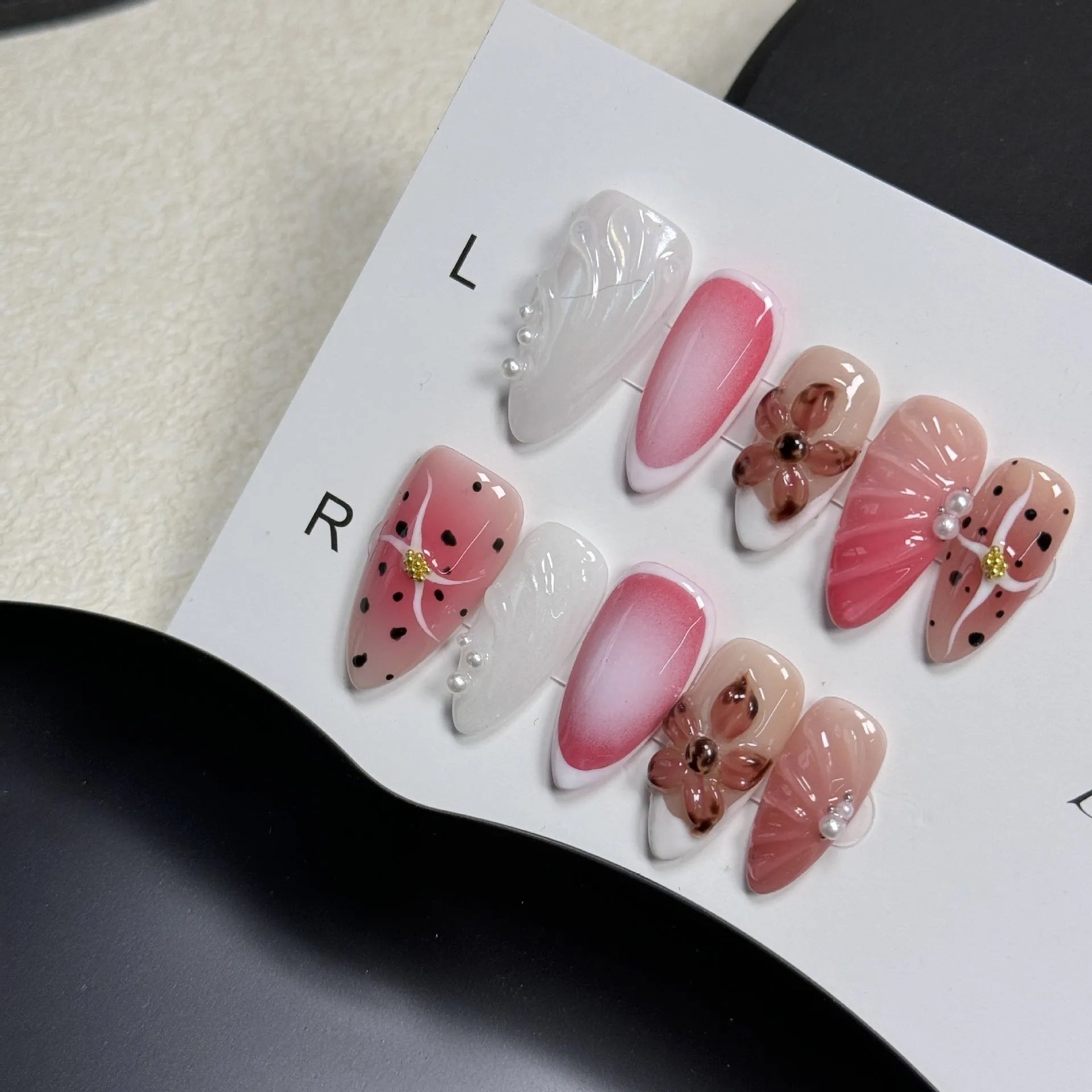 Hand-painted 3D carved nail art patches in embossed candy colours for almond-shaped nails.
