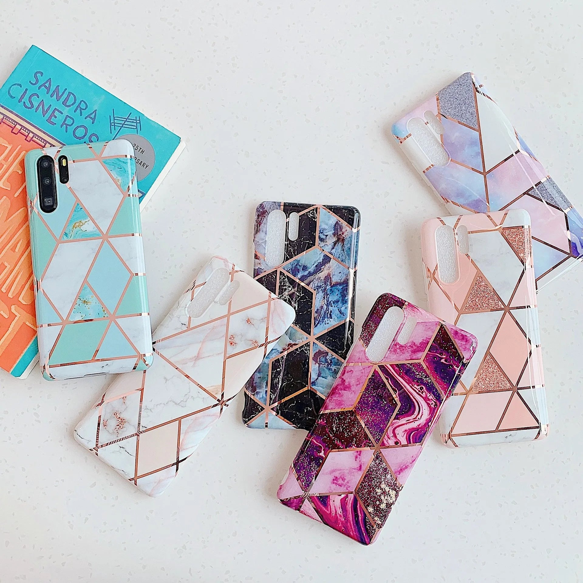 Electroplated marble design TPU mobile phone case for Huawei and Samsung smartphones in various colours.