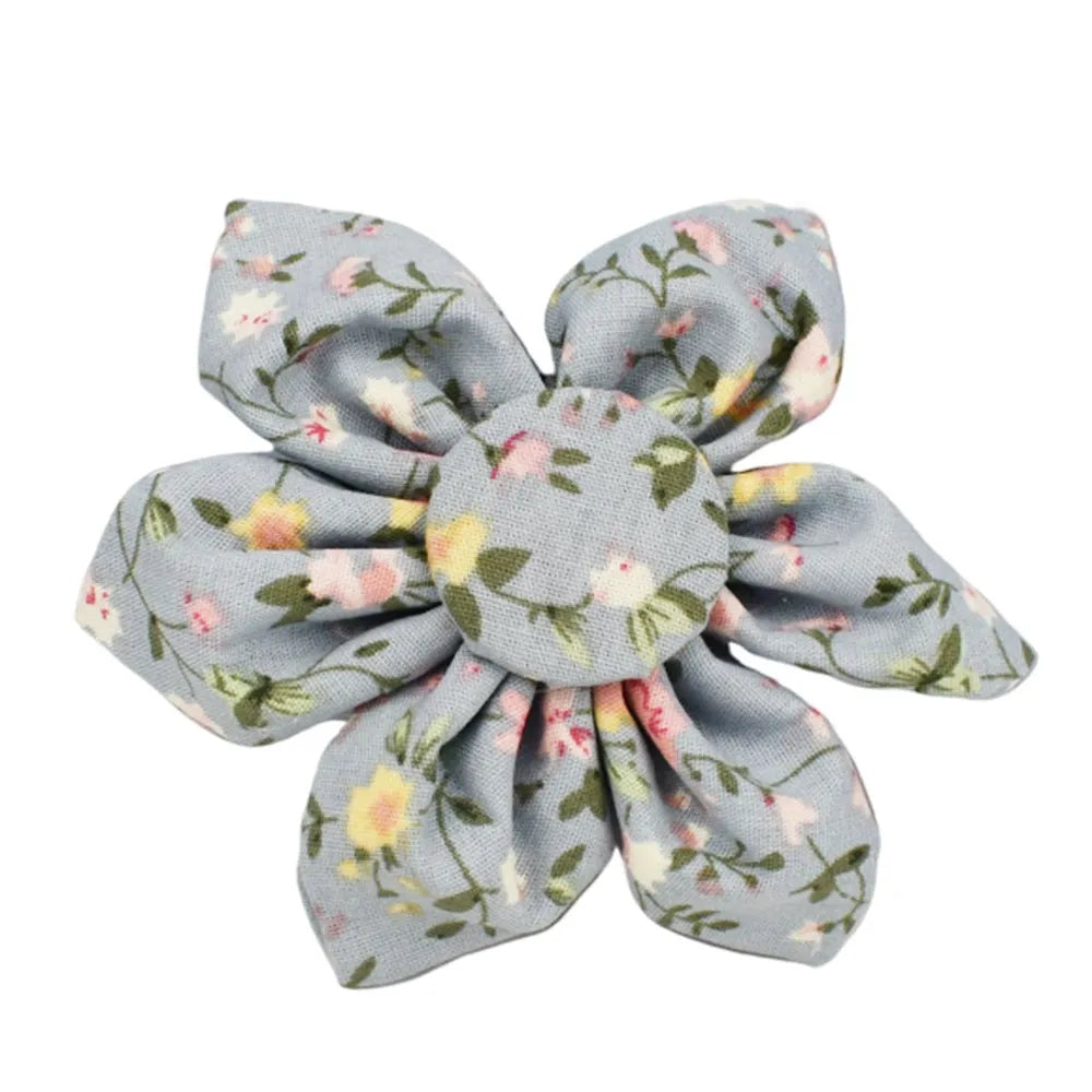 Blue floral patterned cloth dog collar set with matching leash, bow, and vest for small to extra-large dogs.