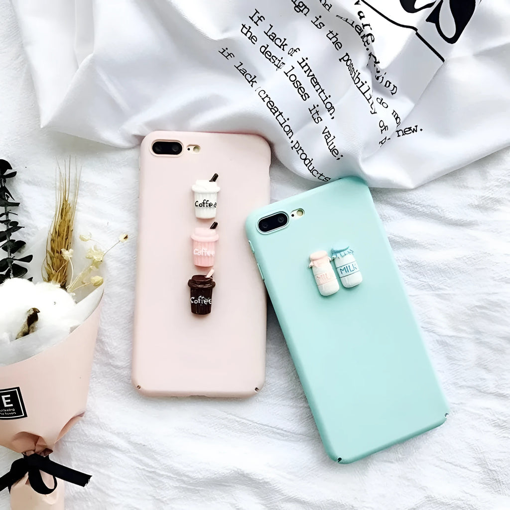 Soft silicone TPU iPhone case featuring a raised 3D cartoon cat design, shown in pink.