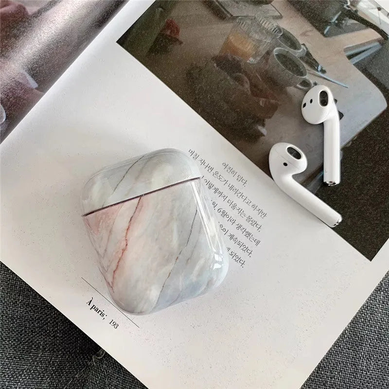 Hard white marble protective case cover for Apple AirPods 1 and AirPods 2 charging case.