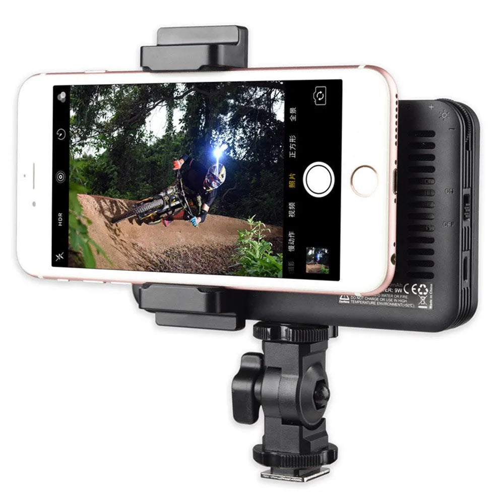 Shenniu M150 ultra-thin silver LED video light panel with 150 beads, shown with L-bracket for phone or camera mounting.