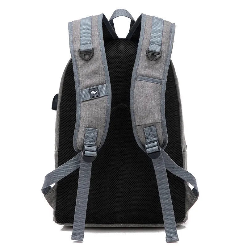 Canvas backpack with USB charging port and computer pocket in multiple colour options