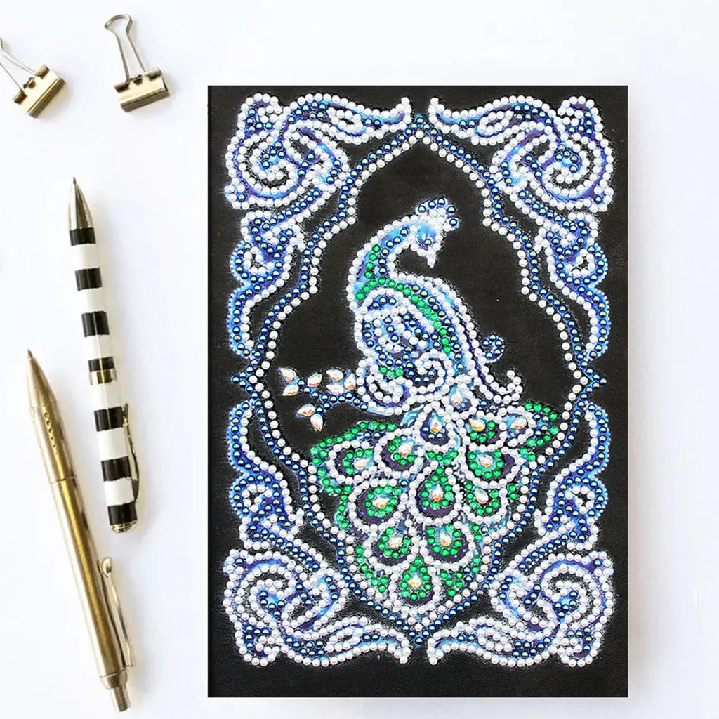 Black A5 diamond painting notebook featuring a peacock pattern with shaped and bright resin drills.