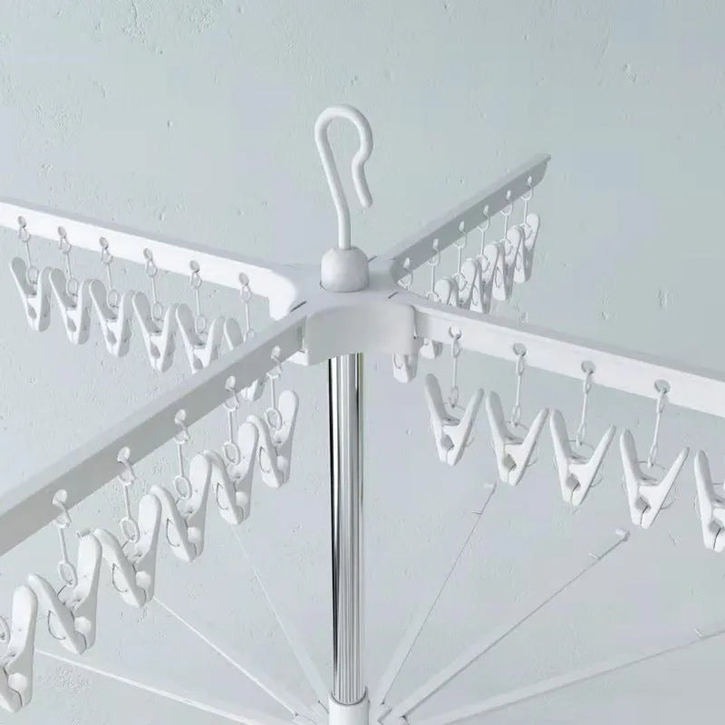 Three-tier stainless steel mobile laundry drying rack with plastic clips and separate clothes hanger