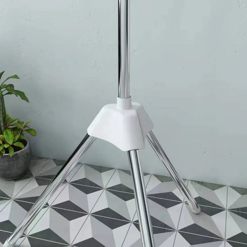 Three-tier stainless steel mobile laundry drying rack with plastic clips and separate clothes hanger