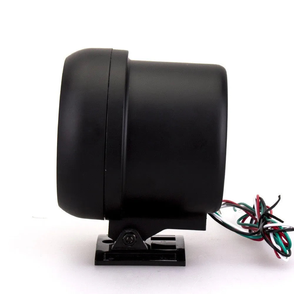 Black universal automotive tachometer with blue light pointer and scale showing rpm.